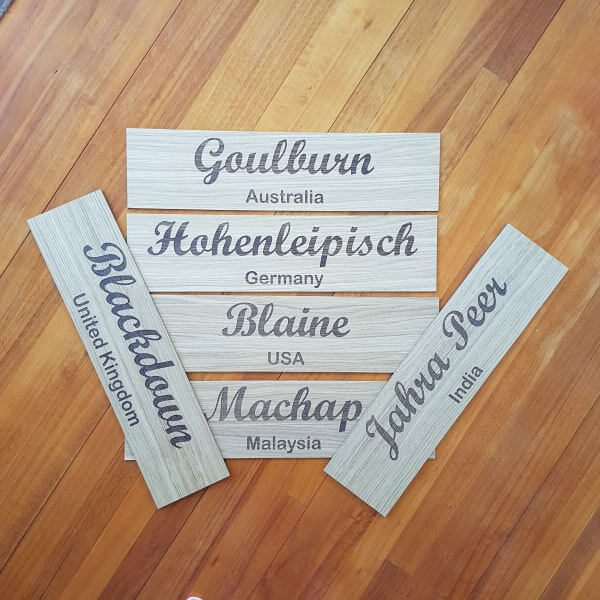 plywood place name signs