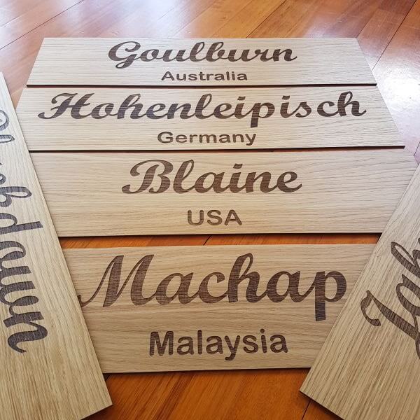 plywood place name signs